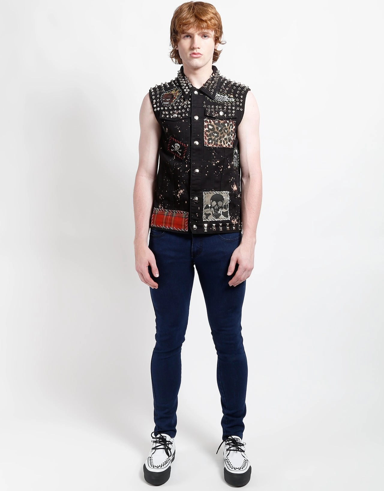 HAND STUDDED PUNK VEST TexturedSurface