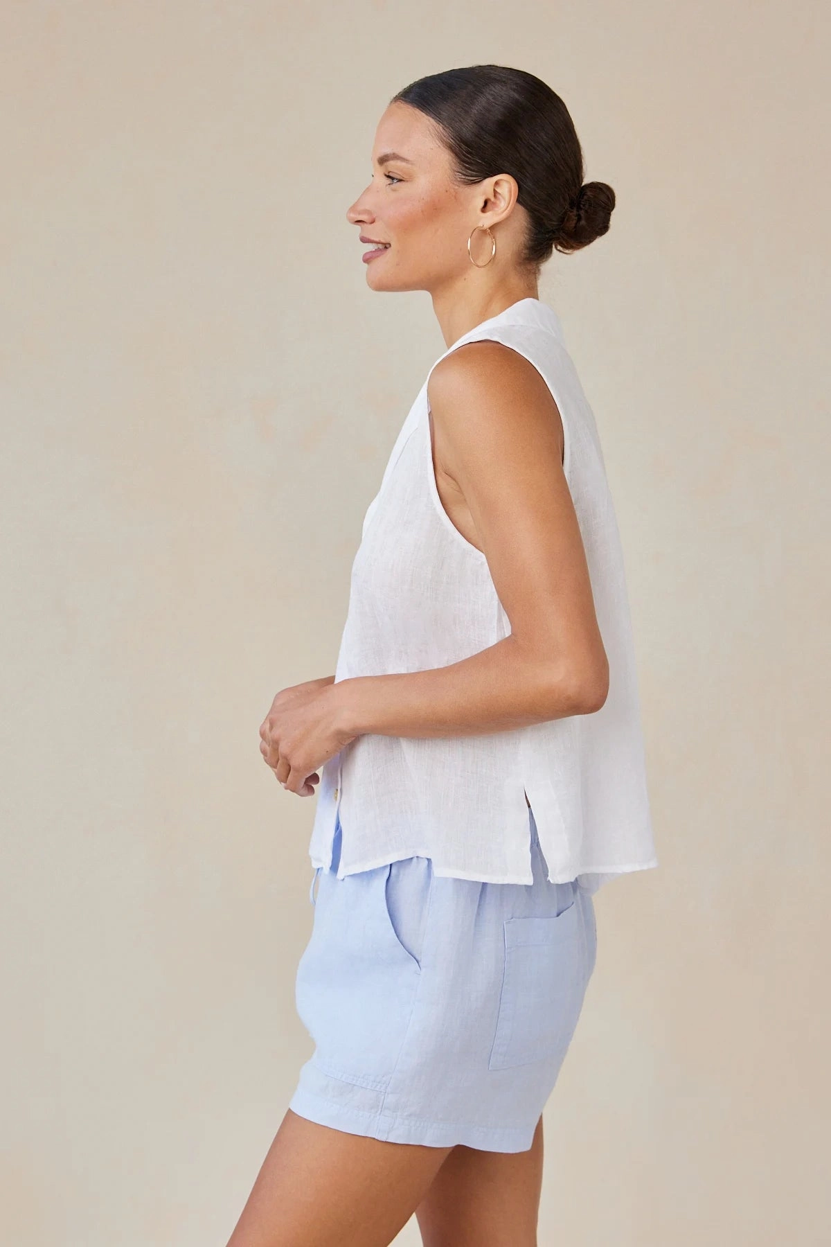 Sleeveless Notch Collar Button Down FeatherlightConstruction