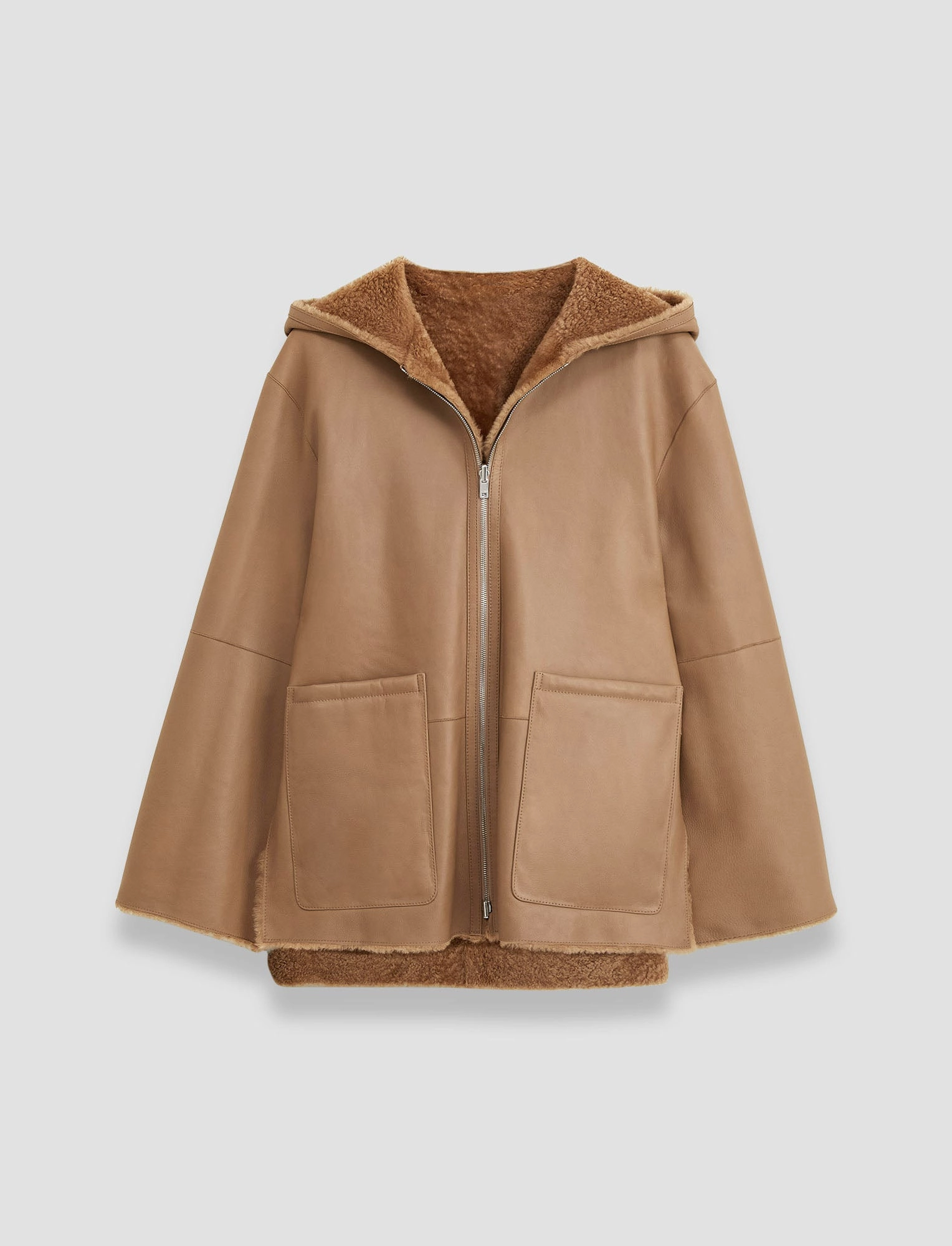 Sleek Outdoor Look Cosser Reversible Shearling Coat