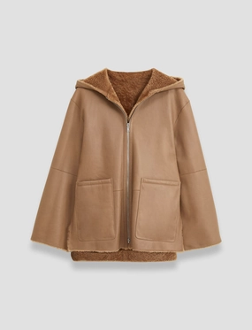 Sleek Outdoor Look Cosser Reversible Shearling Coat
