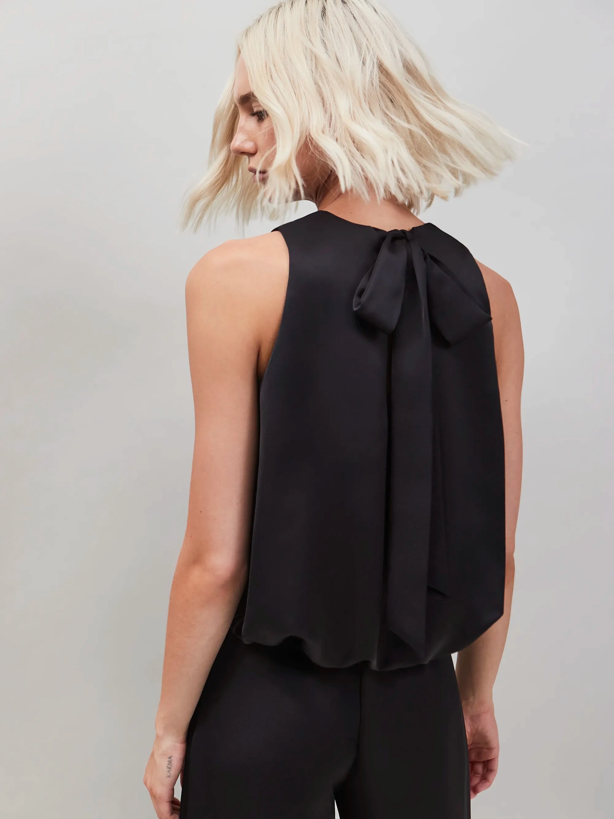 Black Bubble Hem Top Weighted Hem Design