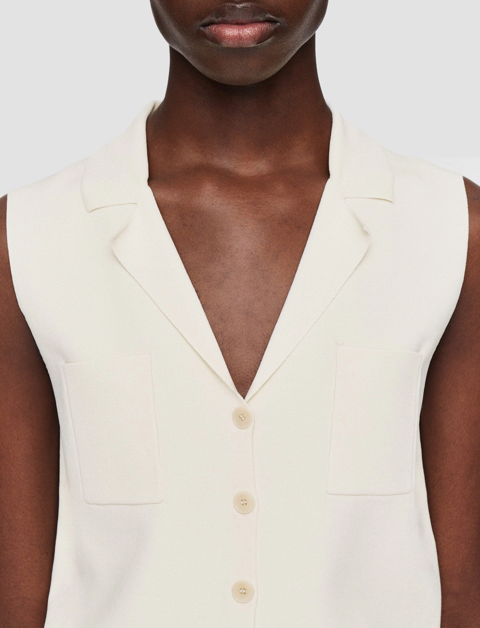 Milano Knit Stretch Vest Eco Conscious Manufacturing Flexible Seam Structure